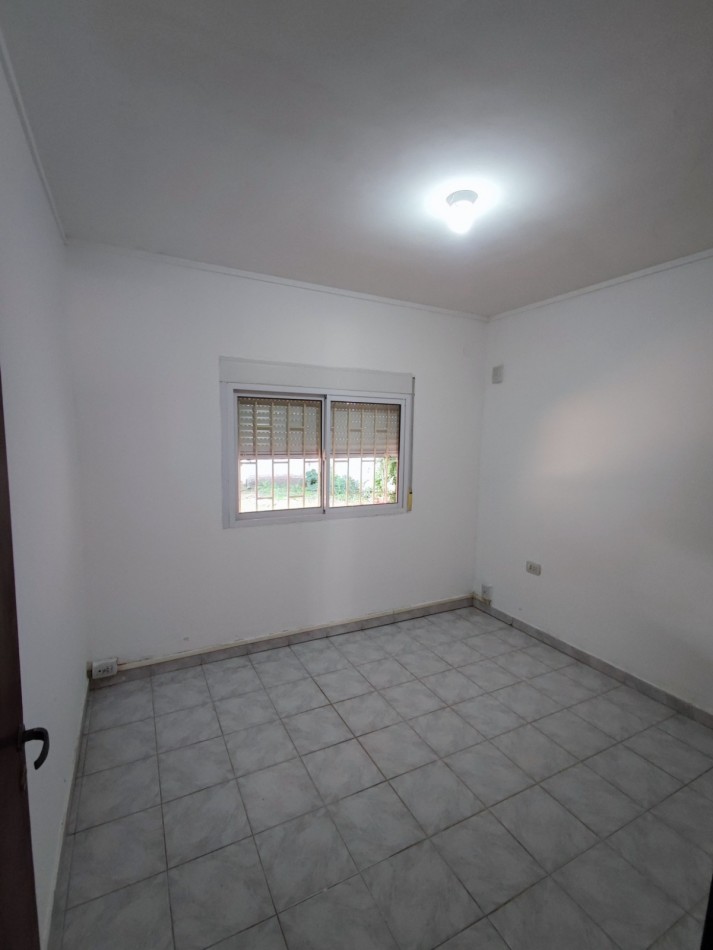 CASA EN SANTO TOME 2/3 DORMITORIOS COCHERA Y PATIO VERDE