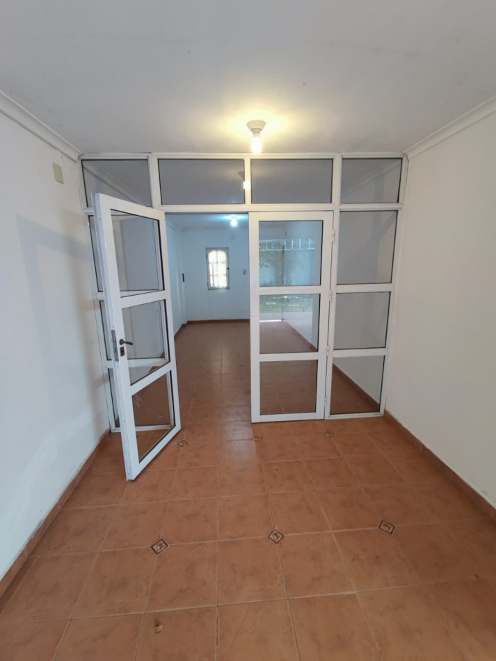 CASA EN SANTO TOME 2/3 DORMITORIOS COCHERA Y PATIO VERDE