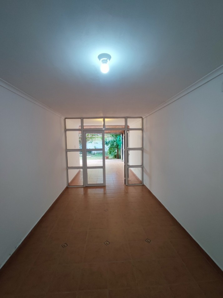 CASA EN SANTO TOME 2/3 DORMITORIOS COCHERA Y PATIO VERDE